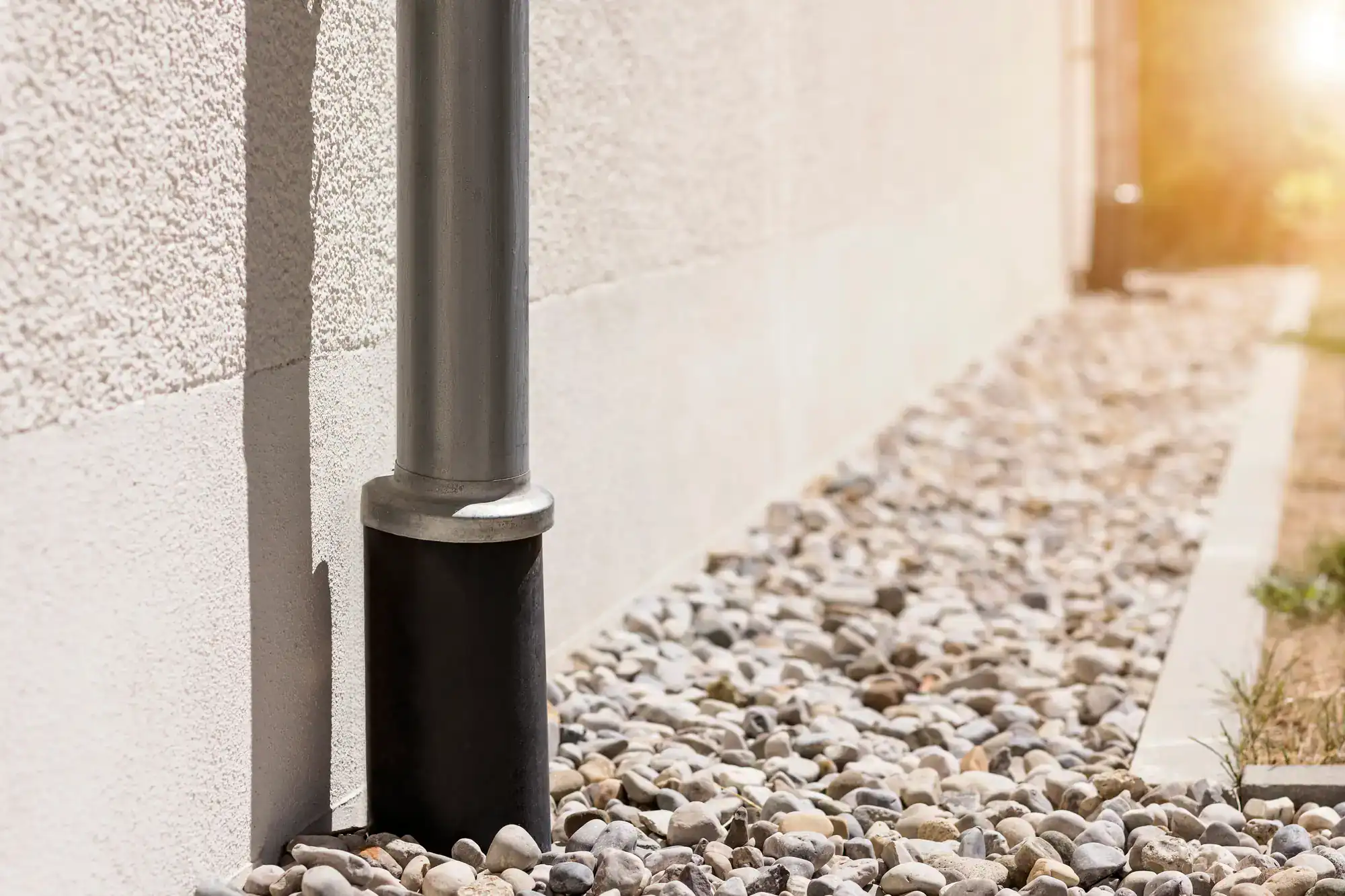 Underground gravel drainage pipe system designed for water runoff control at a residential property in Montgomery County, PA